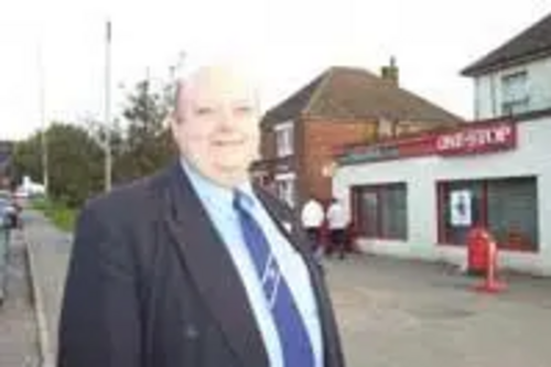 Cllr Peter Smith outside the old Hawkinge Post Office