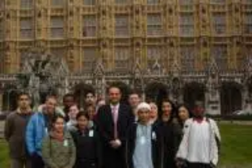 Parmjit Singh Gill MP with some young people from his constituency outside the Houses of Parliament