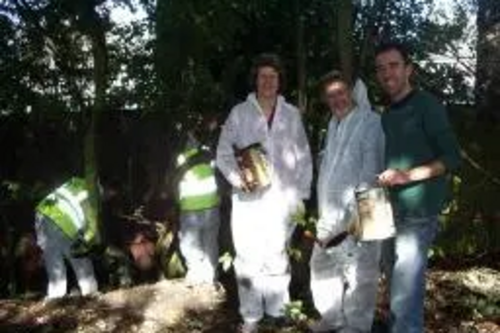 Councillors with pots of paint on the waggonway