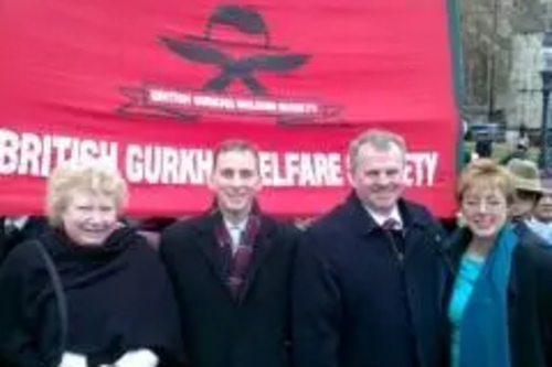 Bev Rolfe, Toby Philpott, Peter Carroll and Lynne Beaumont with Gurkha Welfare banner