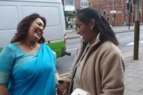 Josh Ramji (left) speaking to a local Belgrave resident on Melton Road.