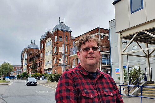 Arran Angus outside Whipps Cross Hospital